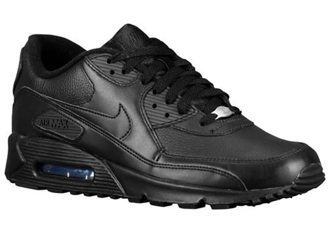 A bulky black leather running shoe from the 90s with an air bubble in the heel